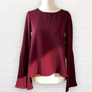 𝅺one Clothing XS burgundy top w/ long bell sleeves and open back. Sz XS.